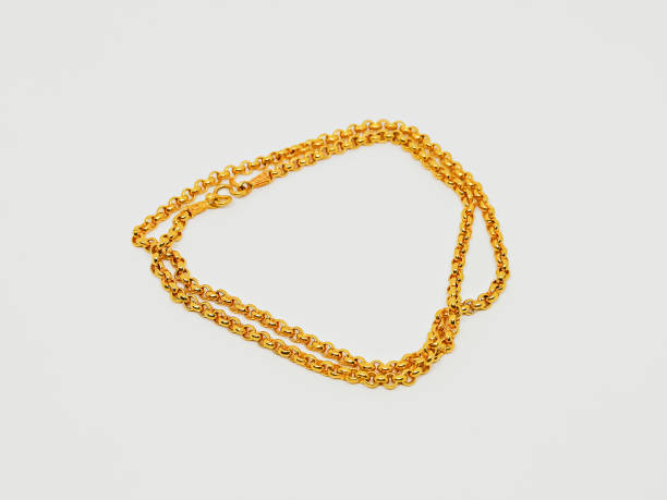 istock 24 Karat yellow gold necklace 909092790