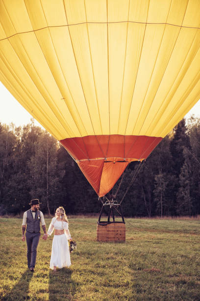 istock bride and groom outdoors. wedding ceremony. wedding arch. 909093832
