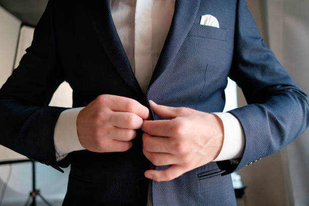 istock groom dress on wedding day 909098534