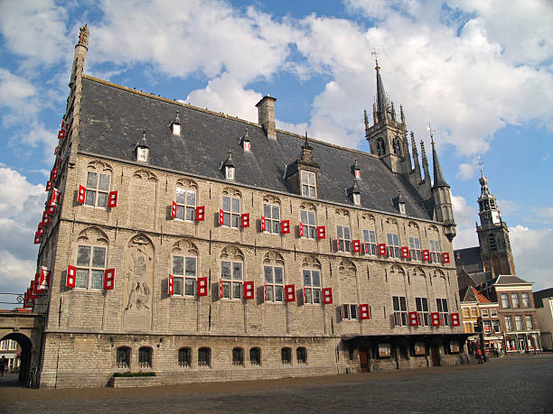 istock Gouda 15th century city town hall in summer time. 90909973