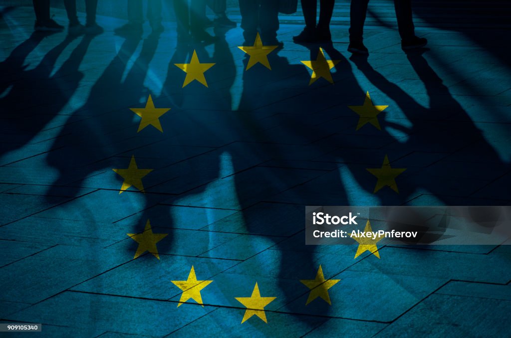 EU Flag and shadows of People concept picture Europe Stock Photo
