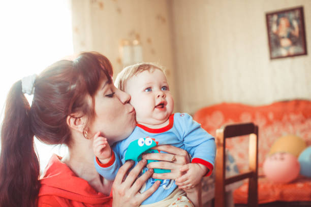 istock mother holding daughter 909108822