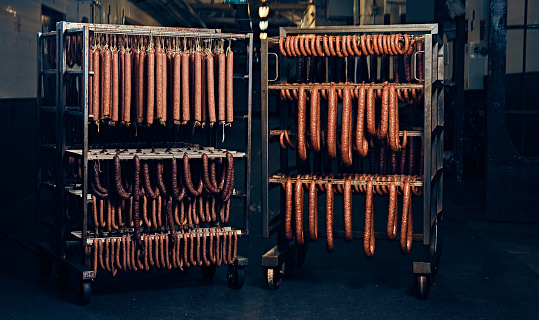 Sausages in the factory freezer storage.