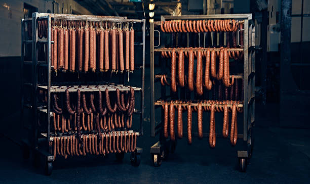 Sausages in the factory storage. stock photo