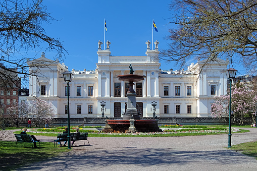 Lund, Sweden - April 30, 2012: The main building of the Lund University in sunny spring day. The building was designed by architect Helgo Zettervall and inaugurated by King Oscar II in 1882.