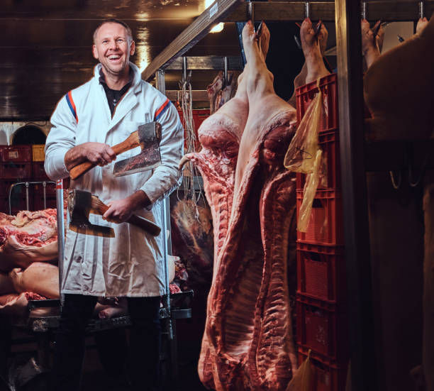 istock A butcher in a meat factory. 909118162