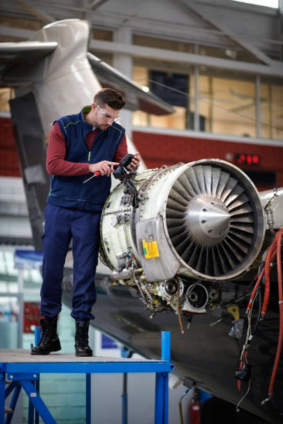 istock Aircraft mechanic in the hangar 909118916