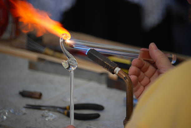 istock Glass blower creates a swan 90912166