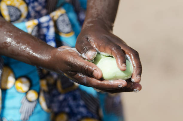 Soap and Water for Clean Hands for African Children stock photo