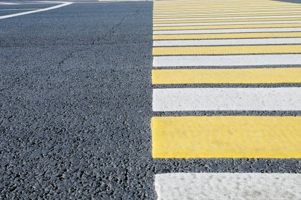 istock Crosswalk  pedestrian crossing through a street 909126876
