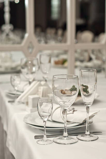 istock Glass dishes on a table on a white tablecloth 909129346