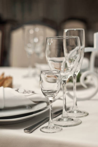 istock Glass dishes on a table on a white tablecloth 909129368
