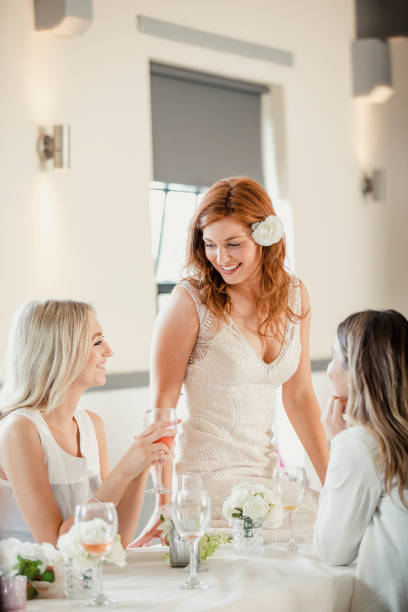 istock Bride Socialising with her Guests 909129440