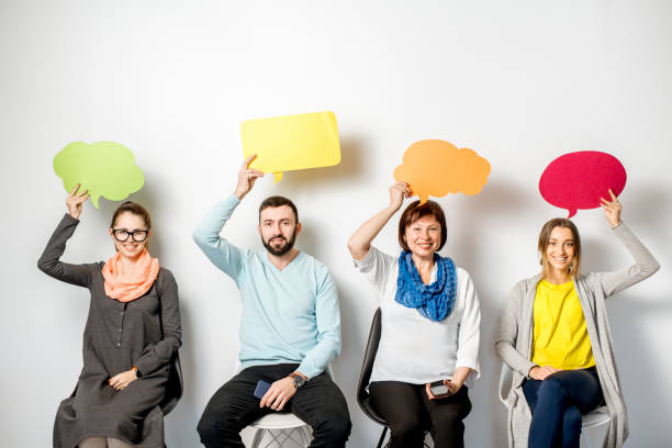 istock People holding colorful bubbles 909133252
