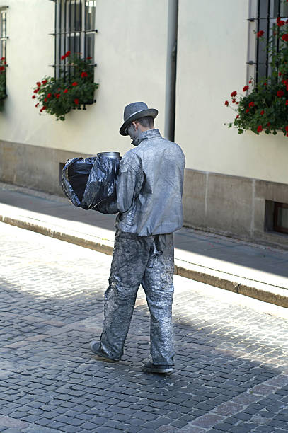 Silver man walking stock photo