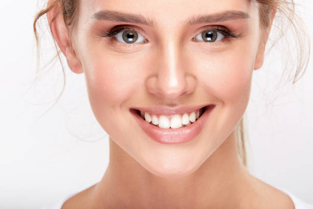 istock Cute girl with white teeth 909134618