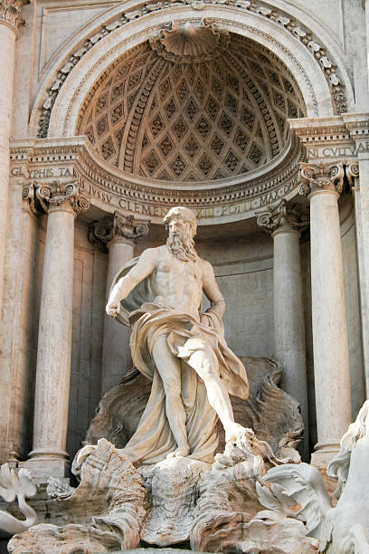 fontana di trevi, statua di nettuno - roman mythology travel destinations vertical trevi fountain foto e immagini stock