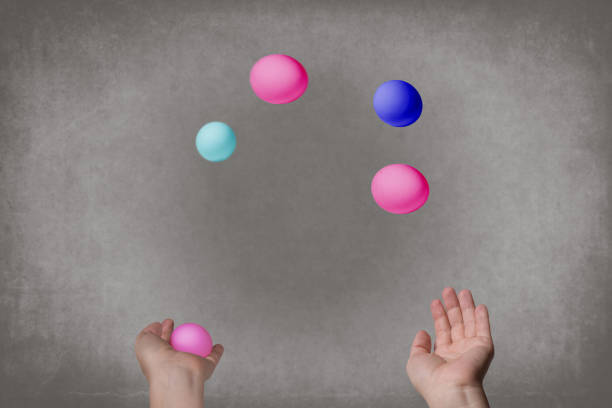 istock Female hands juggle colorful eggs. 909141810