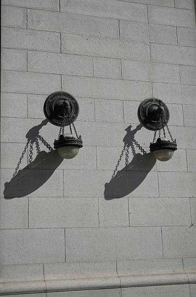 istock Shadows of Twin Lamps on Stone Wall 90914447