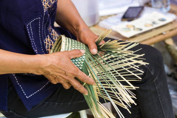 istock The villagers took bamboo stripes to weave into different forms for daily 909145680