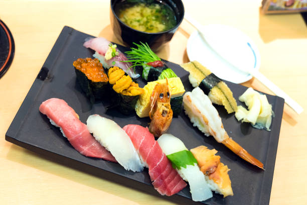 istock sashimi sushi set with chopsticks and soy 909145984