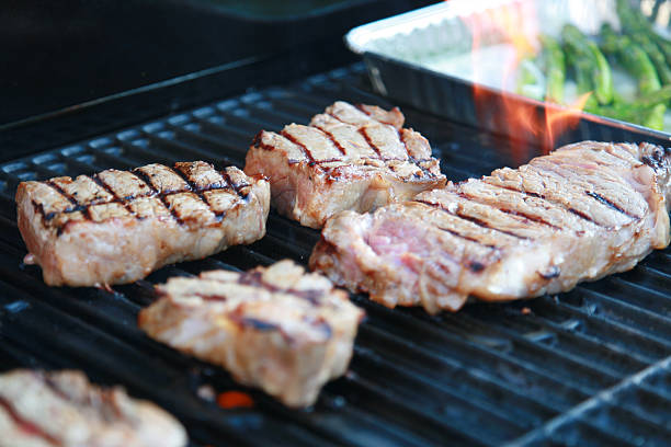 istock Steaks on the grill with asparagus 90914717