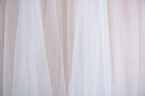 Beautiful tulle fabric on a pink bride dress.