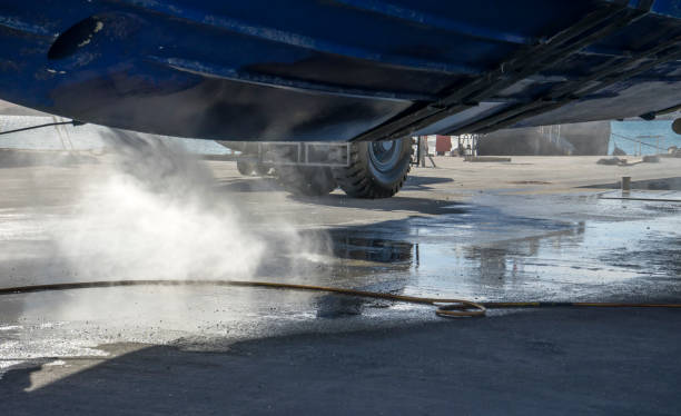 istock Power washing barnacles on a yacht in dry dock 909153316