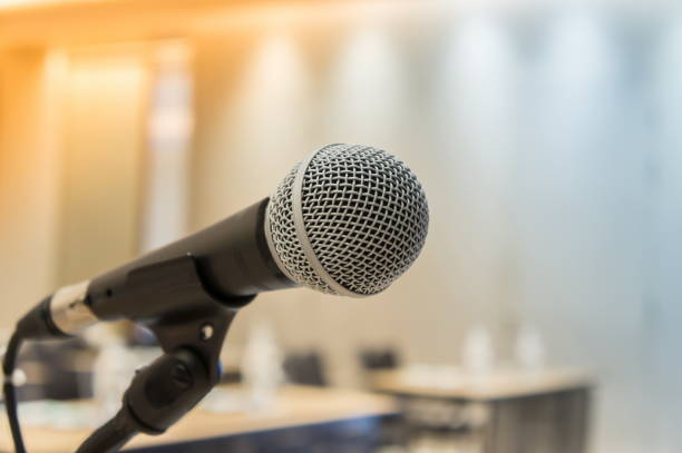 istock Microphone in meeting room for a conference 909154386