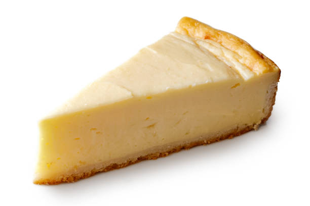istock A slice of plain baked cheesecake isolated on white. 909158280