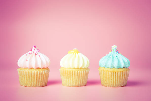 istock Three Mini Fancy cupcake on pink background, pastel tone 909158632