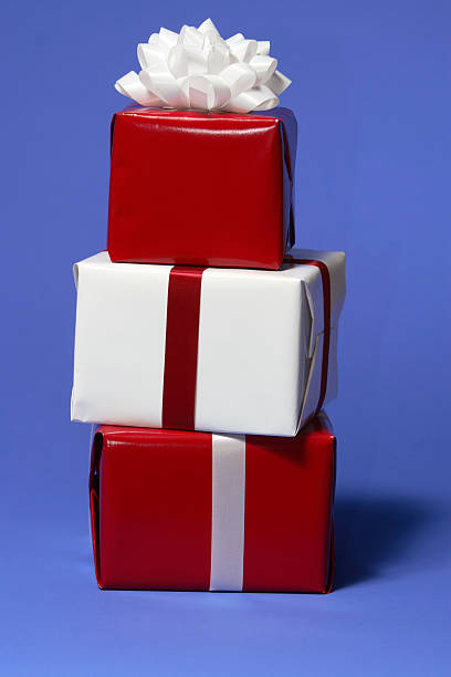 istock Red and White Christmas Presents on Blue 90915908
