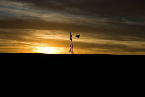 Windmill at Sunset  theishkid stock pictures, royalty-free photos & images