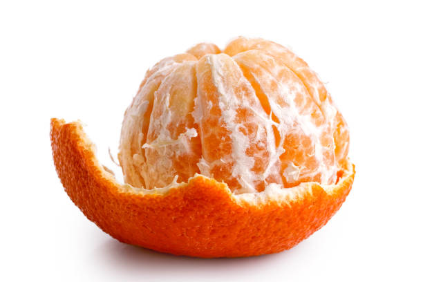istock A half peeled mandarin isolated on white. 909167070