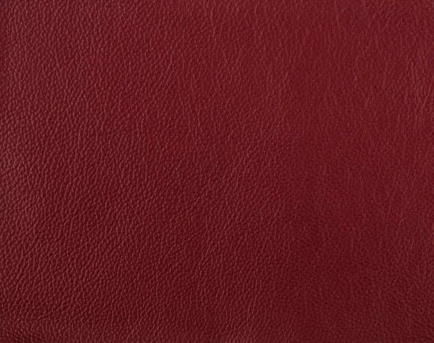 Dark red leather sample Dark red leather sample maroon photos stock pictures, royalty-free photos & images