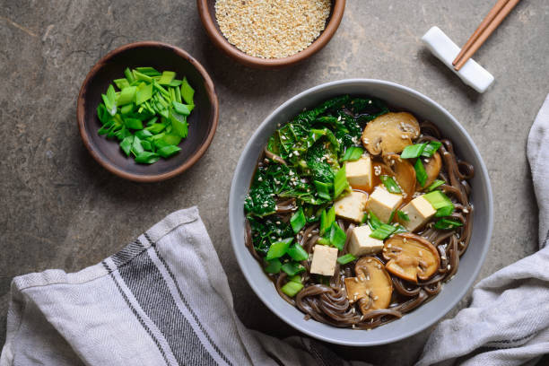 istock Vegetarian soup with kale mushrooms and soba noodle 909172754
