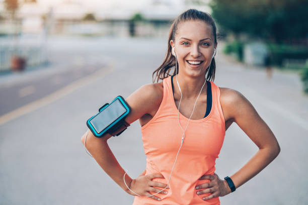istock Smiling young sportswoman 909173116