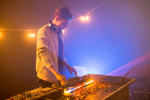 istock DJ Playing Music at Mixer 909175398