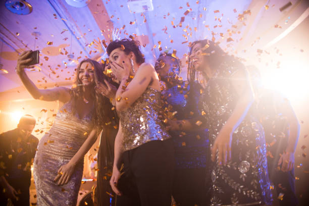istock Girls Taking Selfie at Awesome Party 909175414