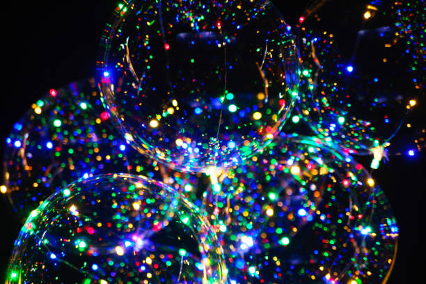 istock LED transparent balloon with multi-colored luminous garland 909176924
