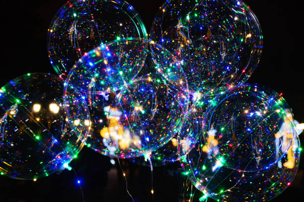 istock LED transparent balloon with multi-colored luminous garland 909179514
