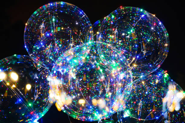istock LED transparent balloon with multi-colored luminous garland 909180050
