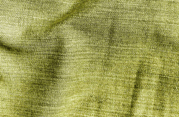 istock Jeans textile texture in yellow color 909180730