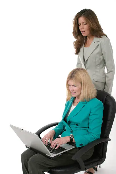 Photo of Two Business Women Working On Laptop