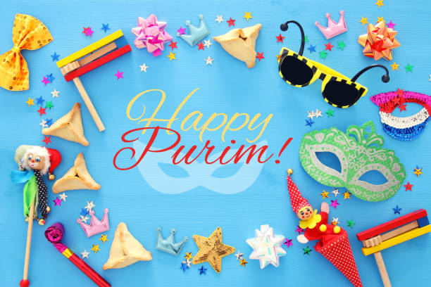 istock Purim celebration concept (jewish carnival holiday). Top view. 909183494
