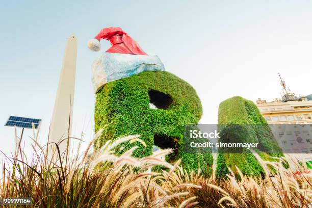 Letters B And A Made With Ligustrines And Adorned Christmas In Front Of The Obelisk Of Buenos Aires Stock Photo - Download Image Now