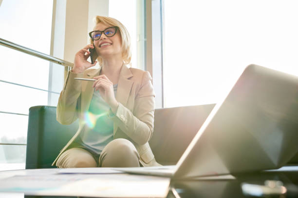 istock Conducting Telephone Negotiations with Business Partner 909193518