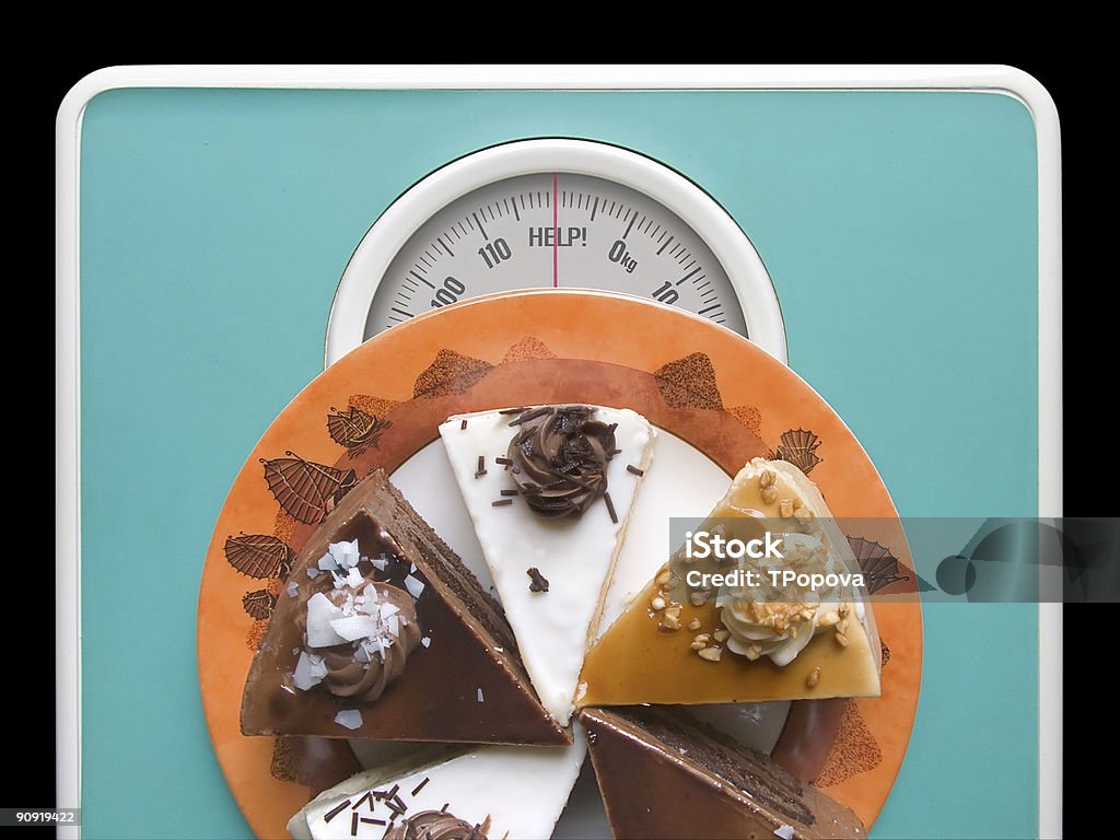 Chocolate cake on weigh-scale - help!  Cake Stock Photo