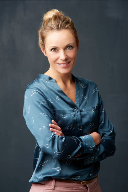 istock Beautiful middle aged woman portrait 909197216