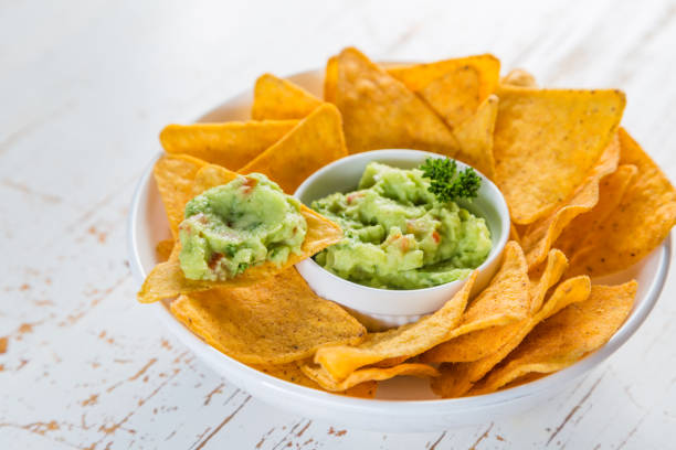 istock Guacamole sauce and nachos 909197412